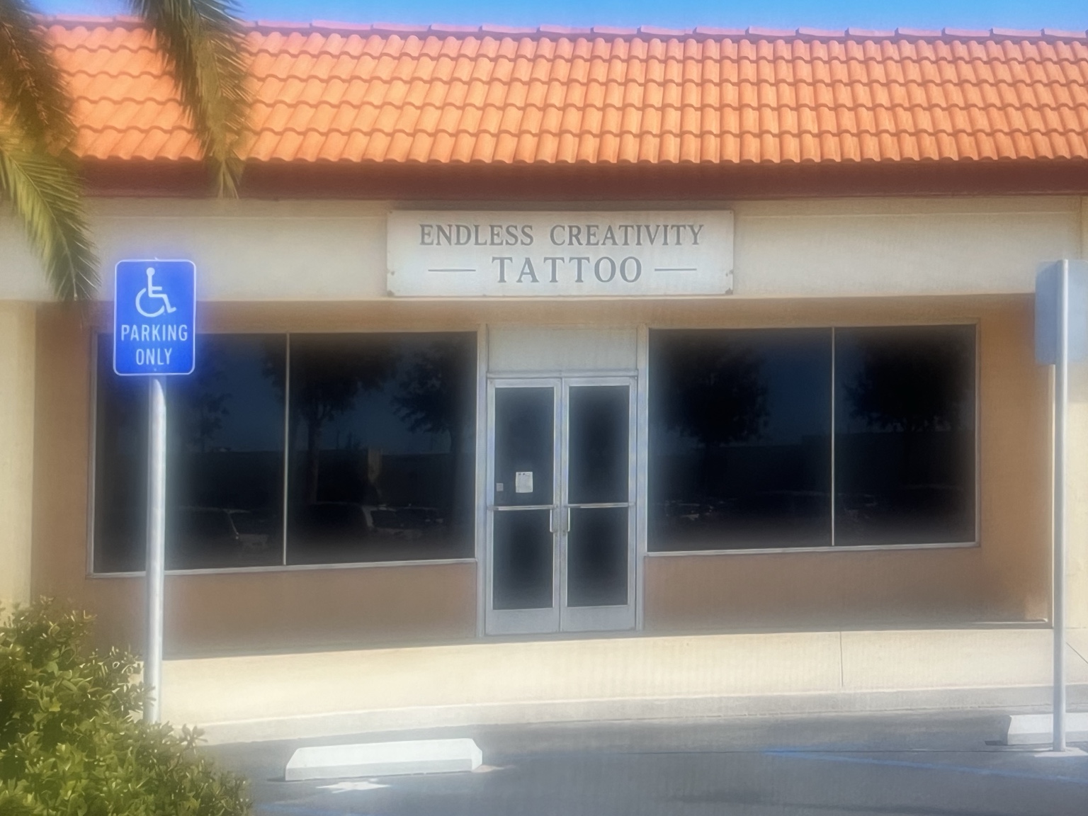 Actual exterior and front entrance of Endless Creativity Tattoo in Chula Vista